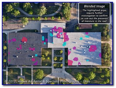 Blended visible and infrared images of a flat roof outlining areas where moisture problems may exist.