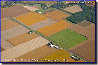 Aerial photo of fall fields in Ohio showing many different colors and textures.
