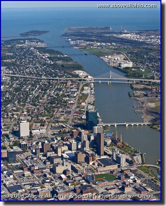 An aerial portrait of Toledo, Ohio, the Maumee River, and Lake Erie.