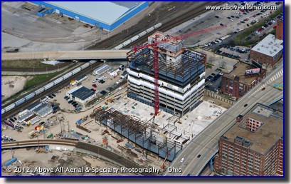 An aerial view of a new lake-side office building called the Flats East Bank, under construction in downtown Cleveland, OH