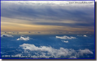 Aerial photo of cold winter skies - overcast altostratus with a few scattered cumulus clouds