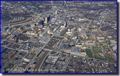 A wide-angle, high oblique aerial photo of downtown Akron, OH.