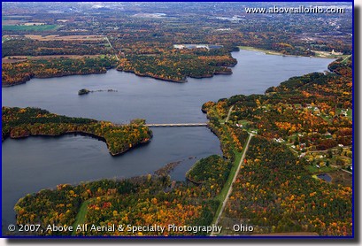 Aerial photograph of Meander Creek Reservoir showing lots of fall foliage; near Youngstown, Ohio